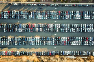 birds eye view of full parking lot